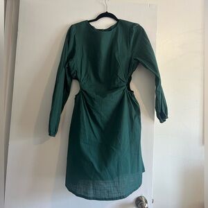 Long sleeve, green linen dress. Side cut outs. Size medium. Worn once,like new!